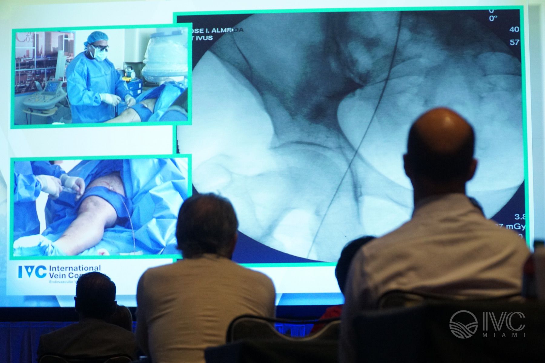 Attendees following imaging and a surgical video feed during a past IVC live case
