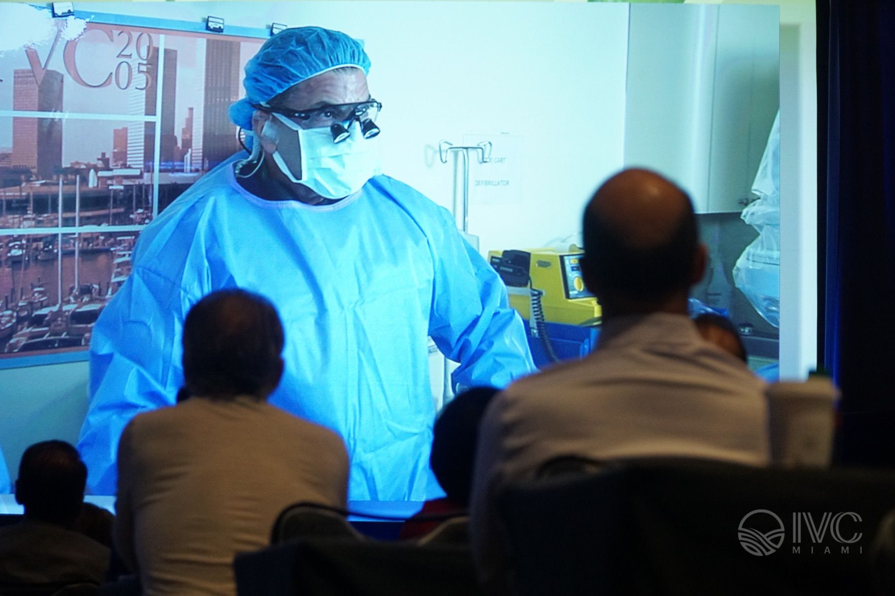 Attendees watching a surgeon on the large screen during a live case at a previous IVC meeting